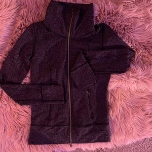 This is a lululemon tight fit zip up! It is and older version but good condition